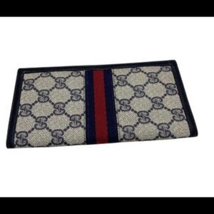 Gucci supreme vintage check book